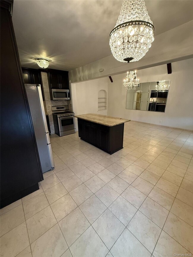 Building Photo - 54-40 80th St Unit 1