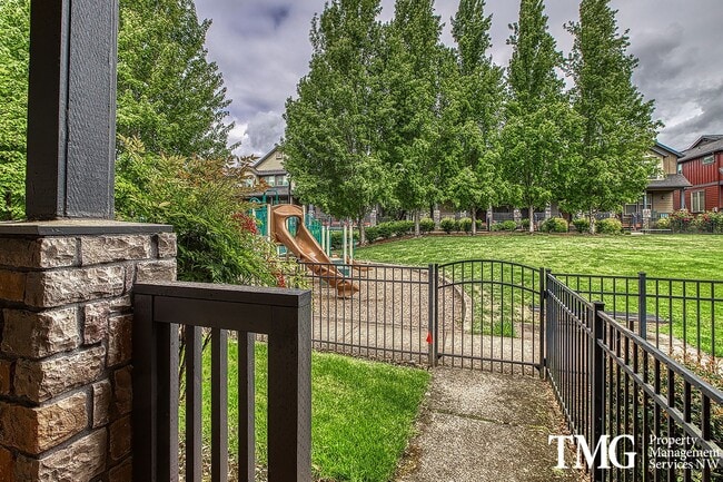 Photo - Gorgeous 4-bedroom Townhome with garage and washer / dryer in unit.