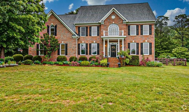 Building Photo - Spacious & Striking 3-story brick Executiv... Rental