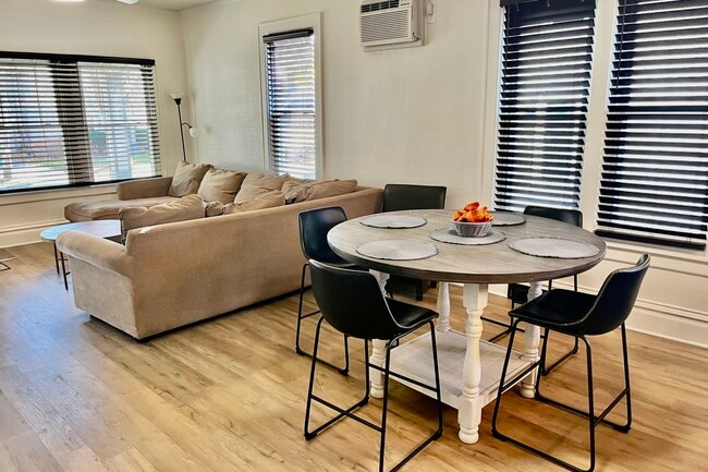 Main level dining area with view of living room