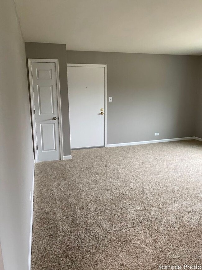 Photo - Carriage House Apartments LLC