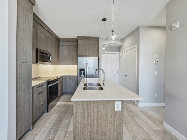 Photo - 63 Corner Glen Crois. NE Unit 1421