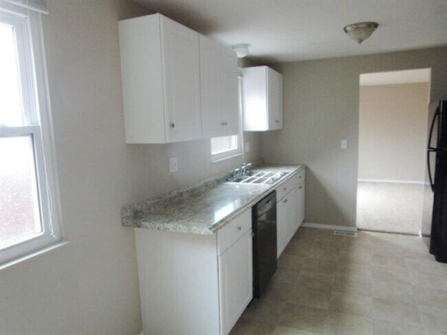 Photo - Spacious 3-Bedroom 1.5 bath Home with Fenced Yard & Garage – Ready for You!