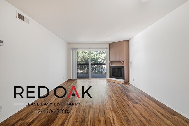 Building Photo - 215 S Madison Ave Unit 404