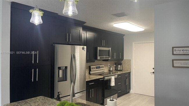 Photo - 10138 Royal Palm Blvd