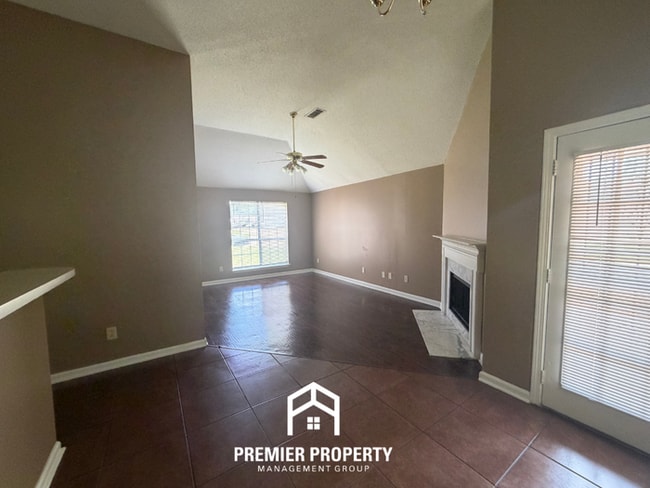 3BR/2BA Bartlett Rental with Marble Fireplace, High Vaulted Ceilings & Fenced Yard