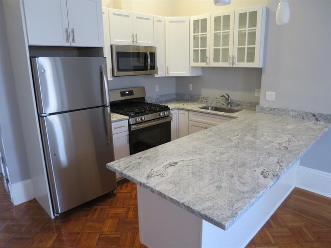 Building Photo - 61 Adams St Unit 1