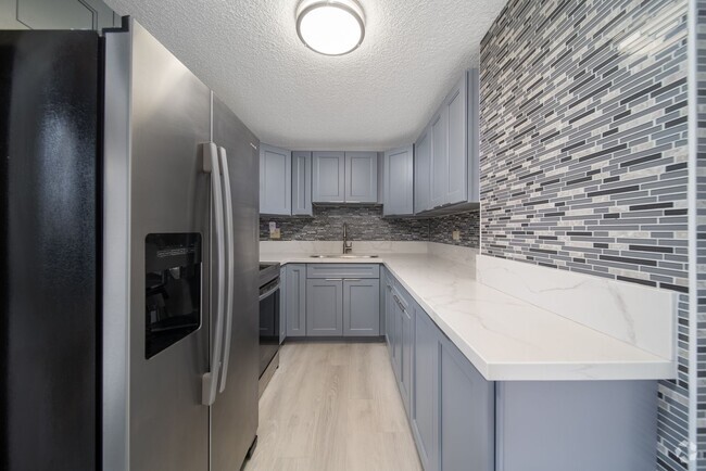 Building Photo - Upgraded Condo w/ Assigned Parking Near H1...