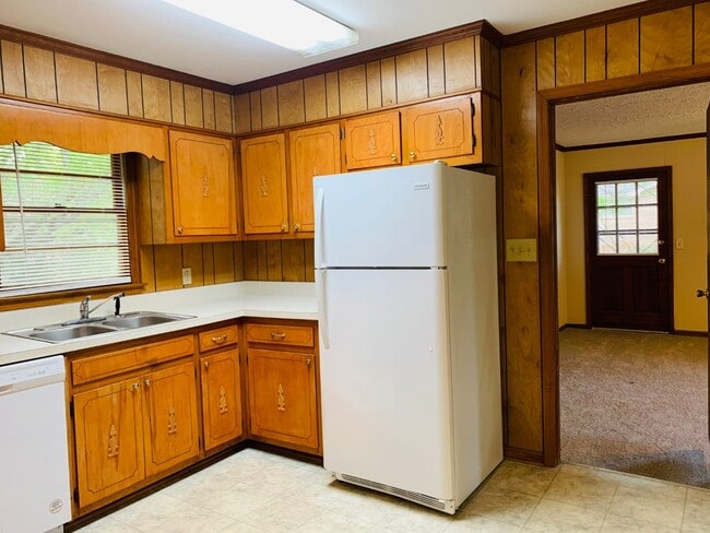 Photo - Wow, great location, newly renovated, 4 beds/2 bath, private fenced yard, sun room/office, must see!