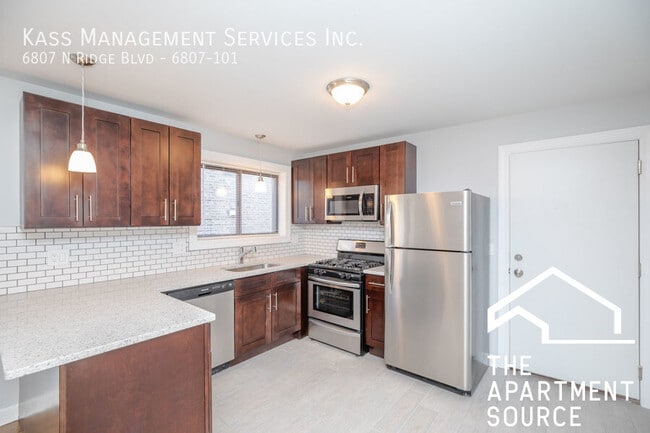 Building Photo - 6807 N Ridge Blvd Unit 101