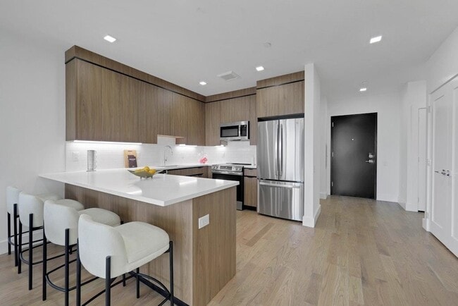 Building Photo - 8404 4th Ave Unit 201