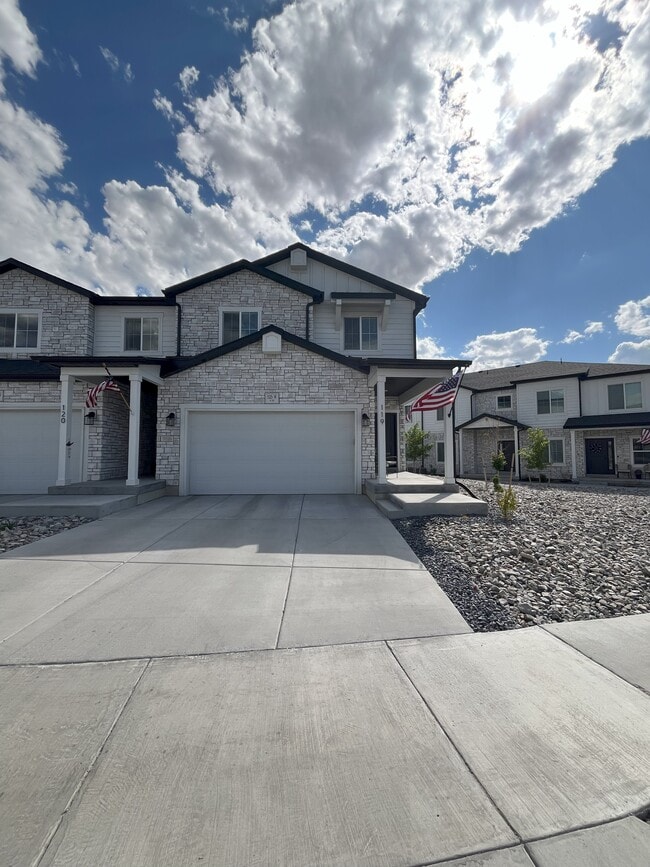 Front View with Two-Car Garage - 525 W Caroles Way Rental