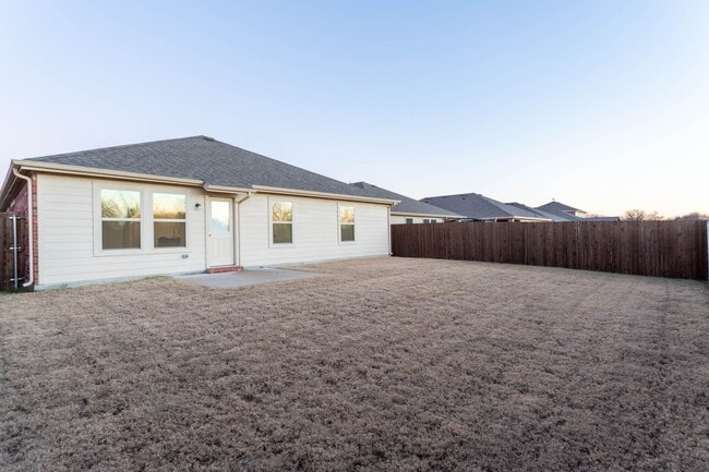 Photo - Located in the Trails at Riverstone community, this inviting 5-bedroom, 2-bathroom home offers a ...