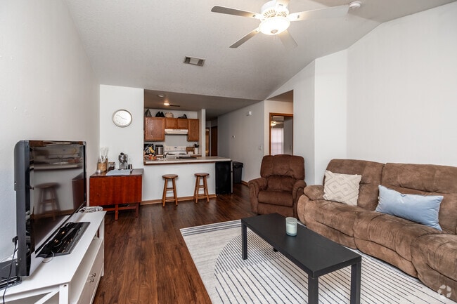 4BR, 2BA - 1,160SF - Living Room - West Ridge Apartments