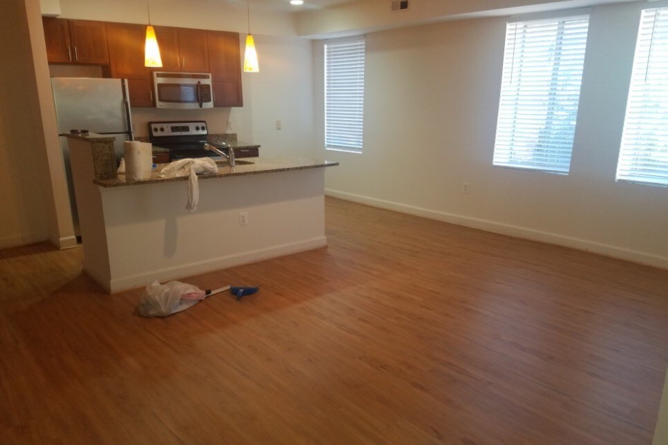 Living room with granite breakfast bar - 5405 9th St NW Condo
