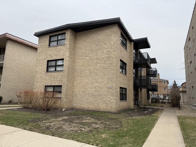 Photo - 2431 N 76th Ct Apartments