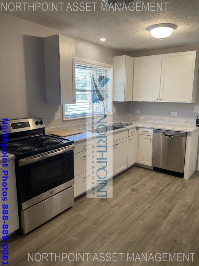 Photo - Charming Ranch-Style Residence With Three Bedrooms and Two Baths