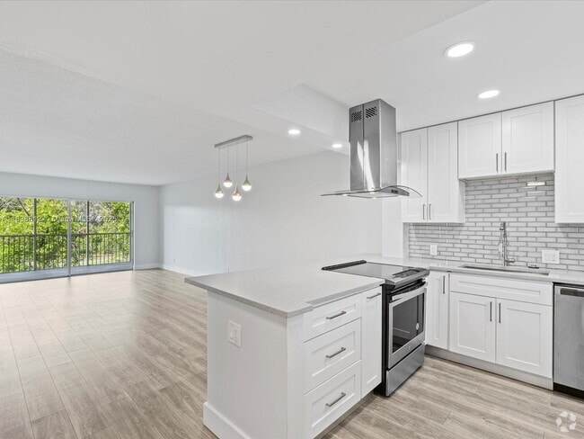 Building Photo - 3150 N Palm Aire Dr Unit 406 Rental