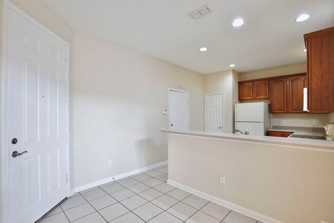 Photo - Beautiful 3/3.5 Townhome with a Spacious 2 Car Garage in the Gate Guarded Community of Spring Isl...