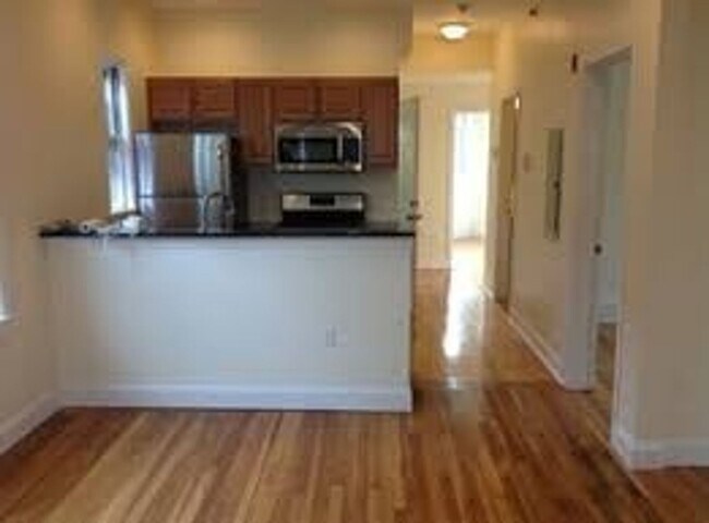 Photo - Convenient Mission Hill Location, In-Unit Washer and Dryer, Eat-in Kitchen, Big Bedrooms