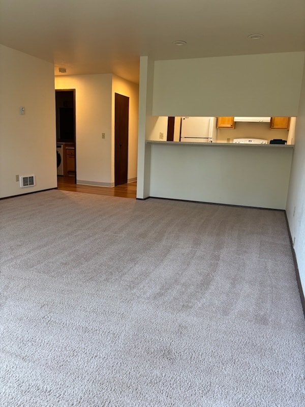 Kitchen from living room - Pinehurst Apartments
