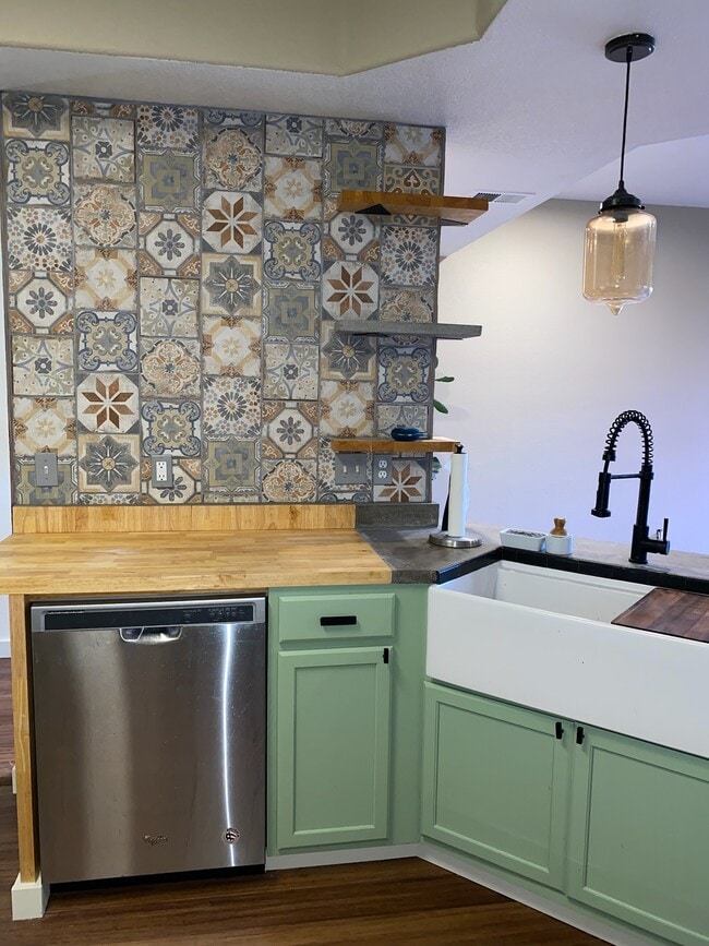 Dish washer with accent wall and shelves - 9056 Gale Blvd Unit 3