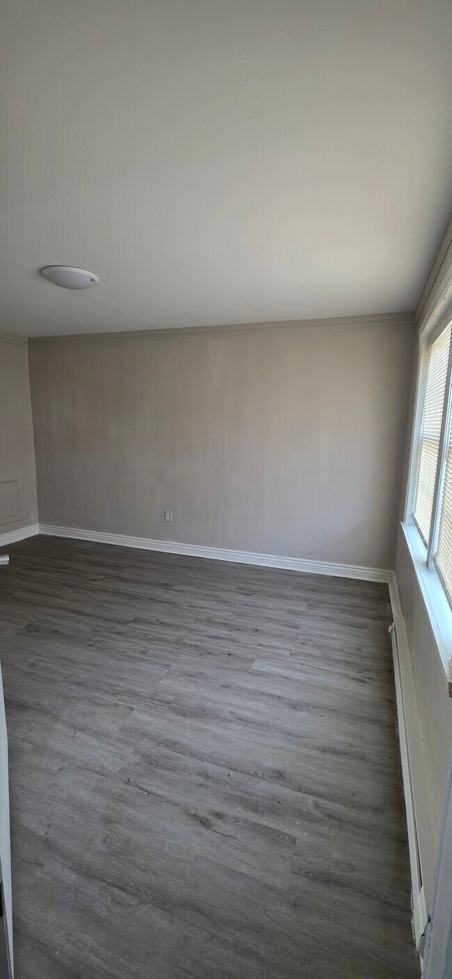 Unit #1 Living Room & Dining Room - 811 Stoll St