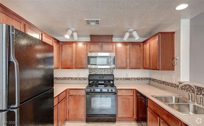 Building Photo - 6868 Sky Pointe Dr Unit 1030 Rental