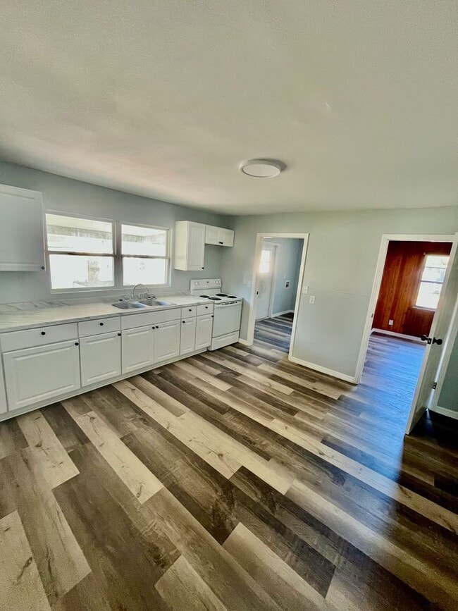 Photo - SPACIOUS Zephyrhills 4BR/1BA Home in the Heart of Downtown!