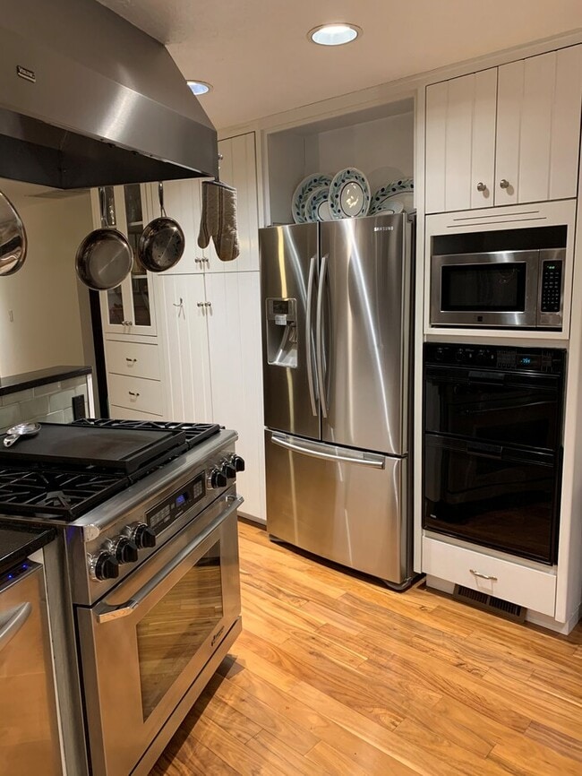 Photo - Spacious 4- Bed Home in Rivergrove Featuring 4-Car Garage, RV Parking, Fenced Yard, Minutes from ...