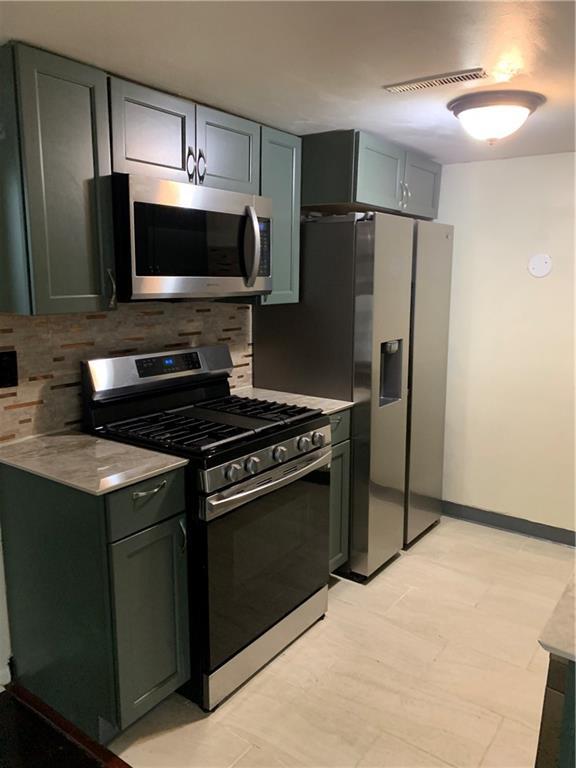 Building Photo - 1139 Hartford Ave Unit 5A