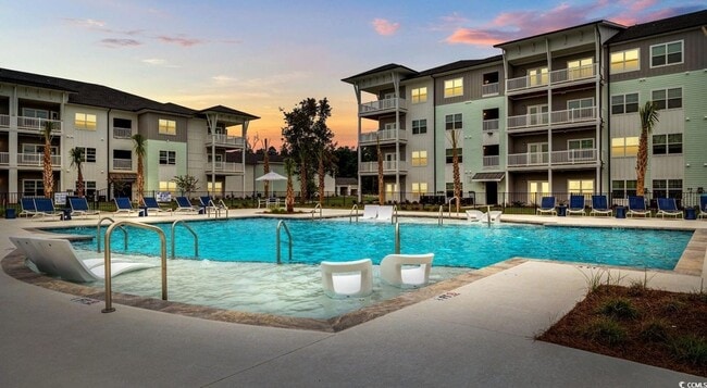 Building Photo - 5895 Arbor Isle Wy Unit A2