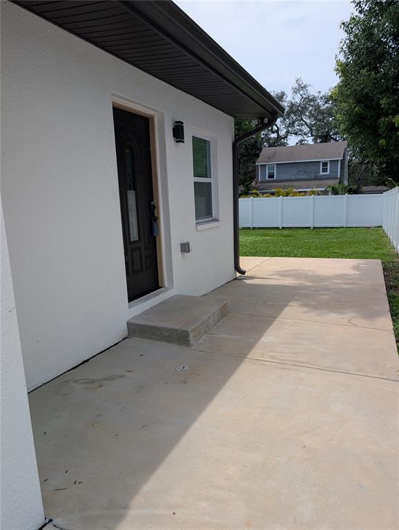 Building Photo - 8904 N Tampa St Unit 2