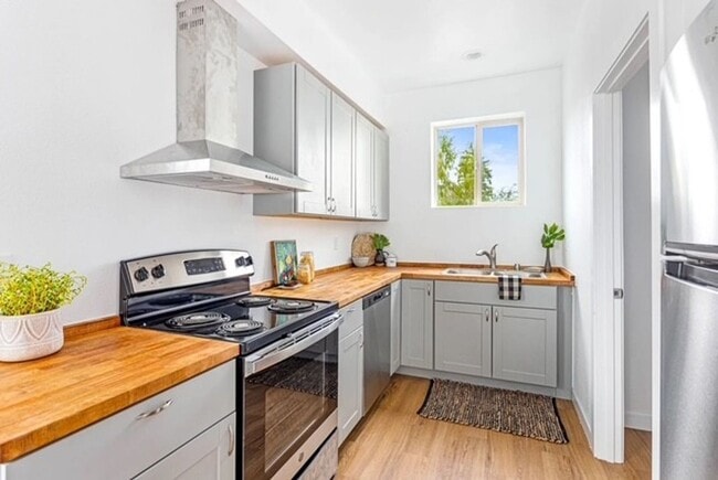 Photo - Two Bedroom 1.5 Bathroom End Unit Condo for Rent