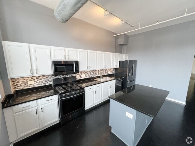 Building Photo - Modern 2-Bedroom Downtown KC Condo with Pa...