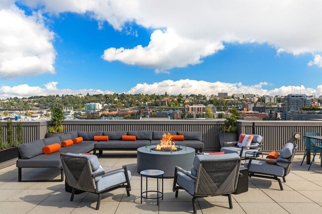 Rooftop deck with lounge areas, gas grills and impeccable views of Lake Union