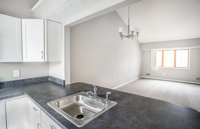 2nd Floor Apartment Kitchen with Pass-Thru / Breakfast Bar & View of Great Room
