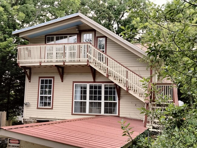 This is the view to your balcony which has a furnished, charming patio set for you to use if you wan - 411 W South St Unit Apartment A