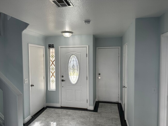 Photo - SE!!! 4 Bedrooms!! Master Downstairs!! No Carpet!! Synthetic Grass front and back!!