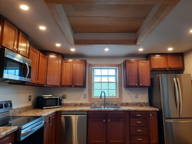 recessed lighting showing recessed ceiling - 247 Main St Unit LUXURY APT D