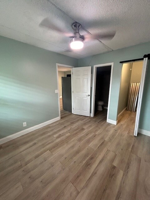 Spacious bedroom will accommodate a queen-size bed - 3211 SW 44th St Unit #105