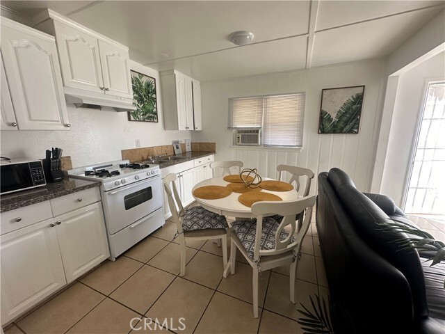 Building Photo - 9723 Belmont St Unit 9723 1/2 Rental