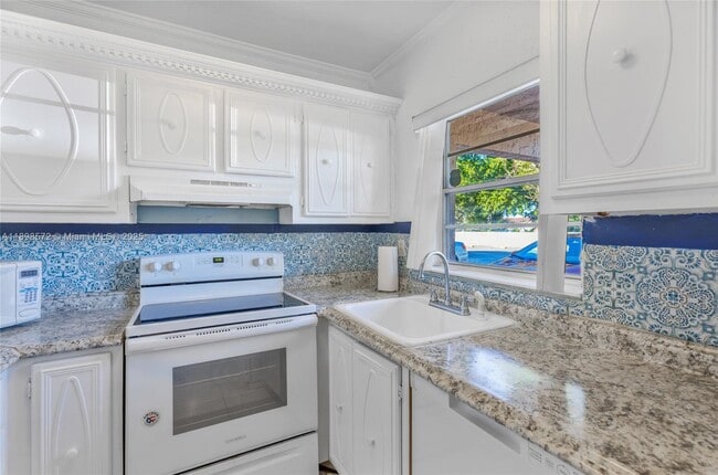 Building Photo - 4143 N Ocean Blvd Unit 104
