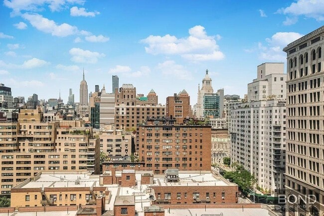 Building Photo - 60 E 8th St Unit 14H Rental