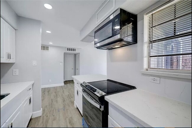 Building Photo - 9550 Deering Dr Unit 210