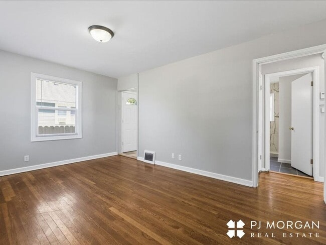 Photo - Stylish Updates + Spacious Yard + 2-Car Ga...