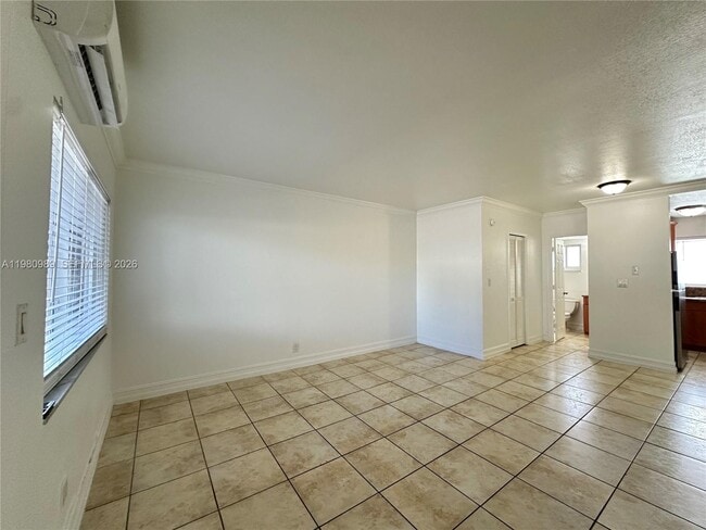 Building Photo - 1400 NE 56th St Unit 113