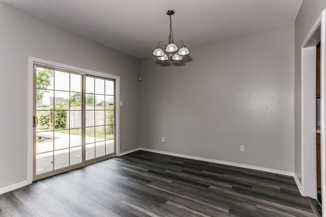Photo - 4 BR/3BA | Newly Renovated Single Family Home |2-Car Covered Parking | Nice backyard!