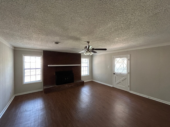 Spacious 4BR/2BA Southaven Home | 1,899 Sq Ft, Hardwood Floors, Brick Fireplace & Patio