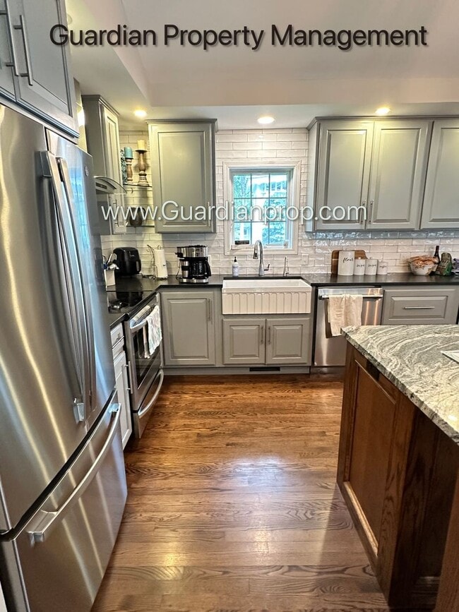 Photo - Maple Grove Single Family Home, Fenced Yard, 3 Car Garage, Deck, Available 7-31